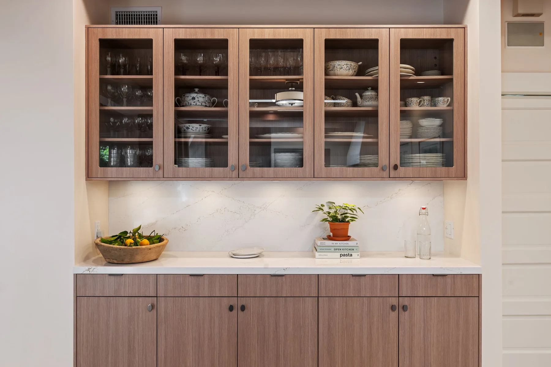 Butler's hutch with five-door glass-front uppers and drawer base