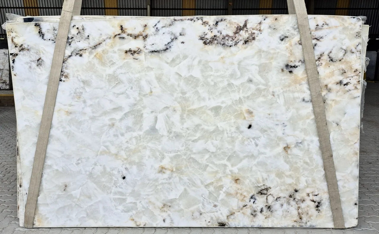 Cristallo quartzite slab with black and gold dendritic veining