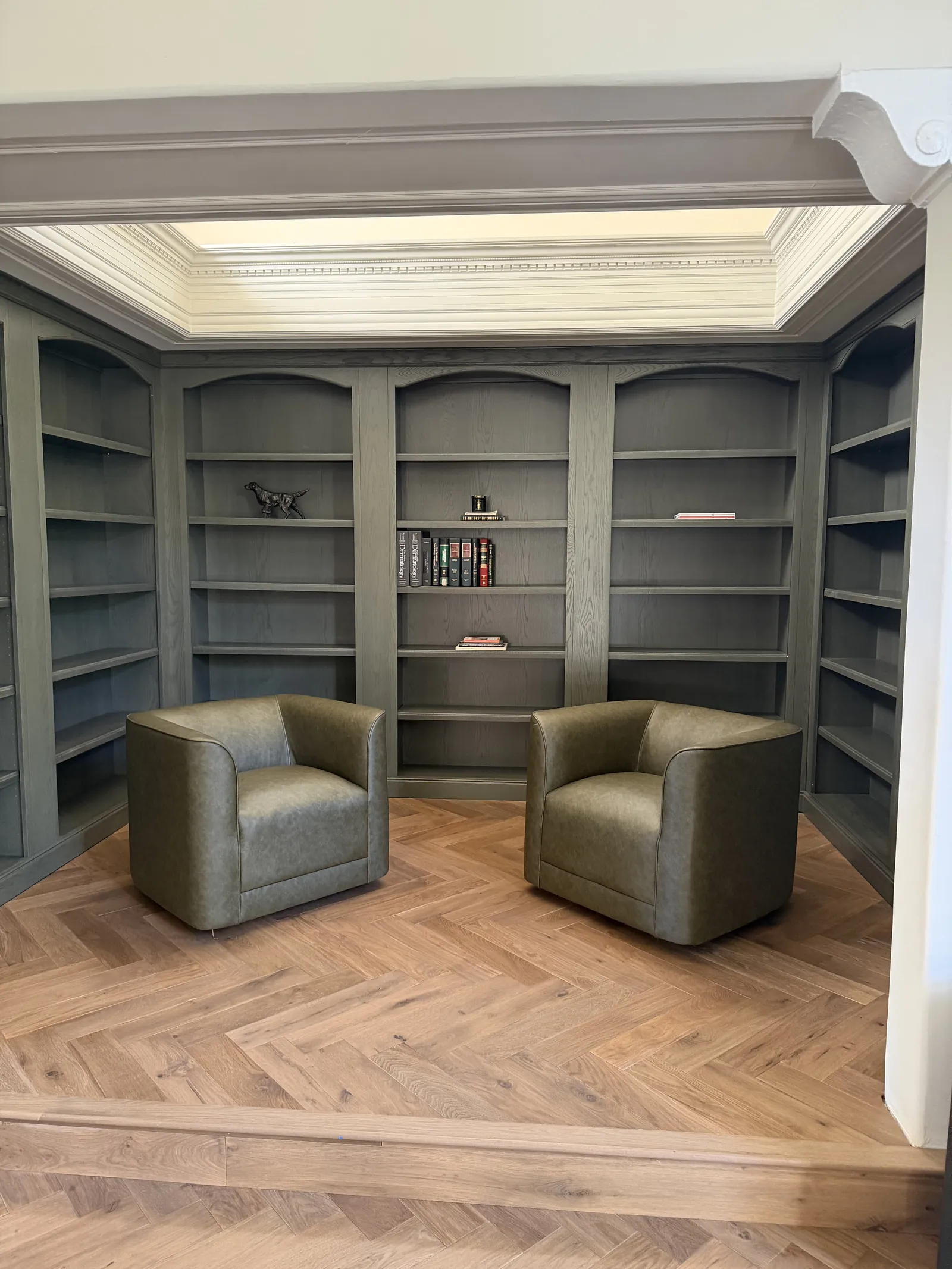 RPN Design La Cañada Flintridge — painted Eclipse library with arched bookcase openings, coffered ceiling, herringbone floor